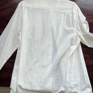 I have here a well cared for used dress shirt. Lightly used like new. White